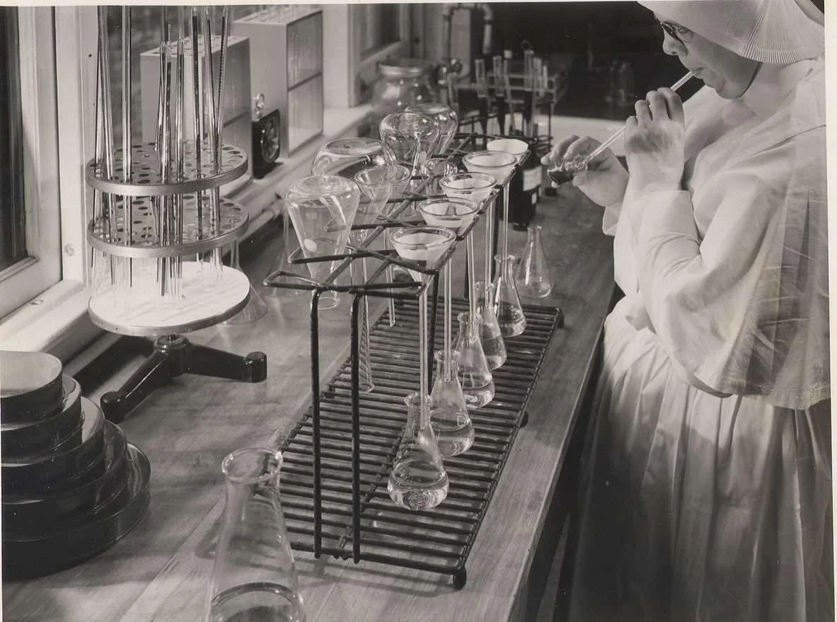 Mid century hospital pharmacies looked very different than today.

In 1951, when Yorktown Memorial Hospital opened, medications were not prepackaged or standardized the way they are now. Pharmacists often measured, mixed, and prepared doses by hand. 