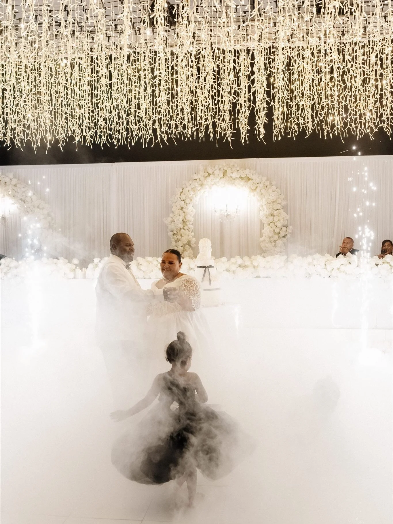 Ending the formalities with pure enchantment ✨

As the bridal waltz and father-daughter dance began, @xplosiveartfireworks had sparklers ignited a glow that danced with every step, and wisps of dry ice curled around the floor like a dream. 

Every tw