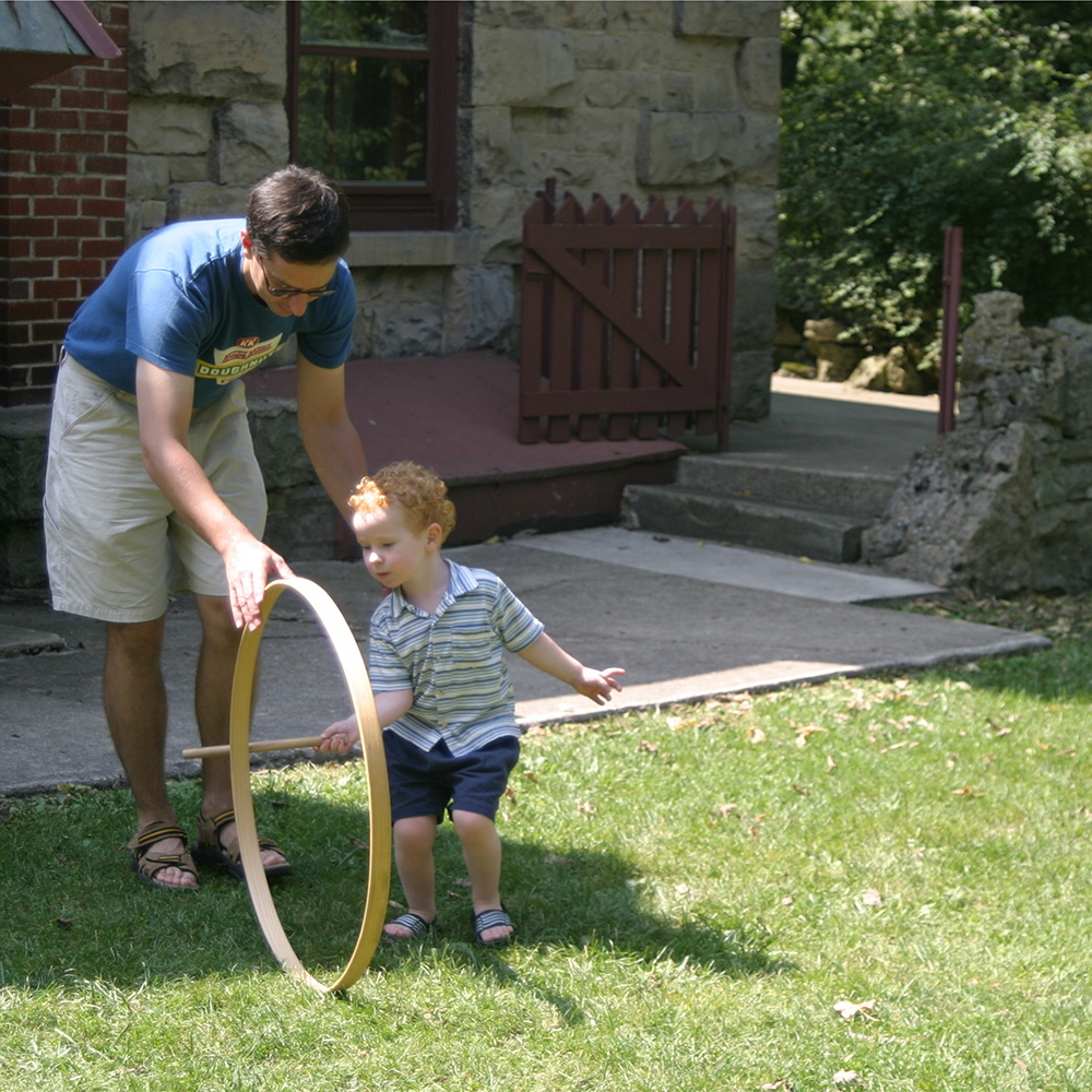 father and son with hoop.jpg