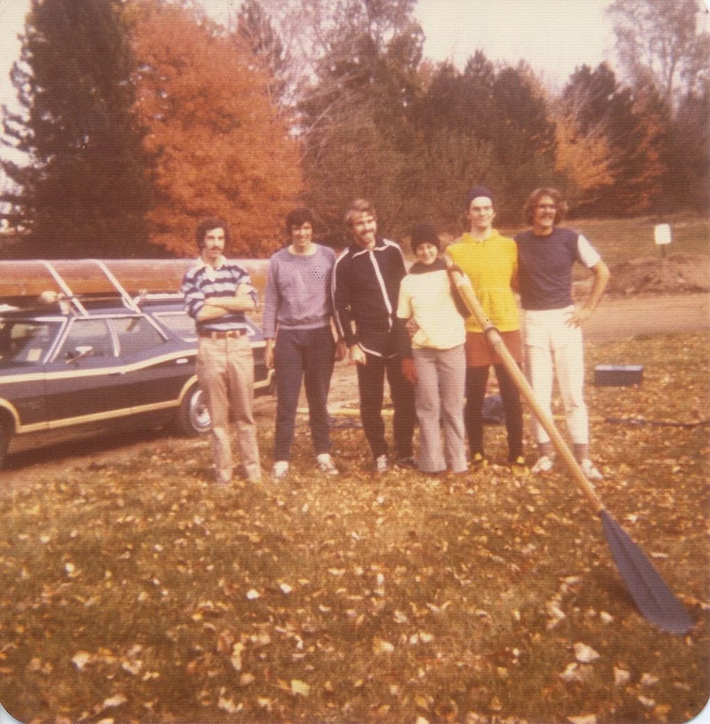 Winning team at the club’s first regatta in Lansing, Michigan. Left to right: Mike Weisman (manager), George Lawrence (bow), Bob Henn (2), Marcy Esler (cox), Grant Esler (3), Mark Doman (stroke). October 23, 1976.