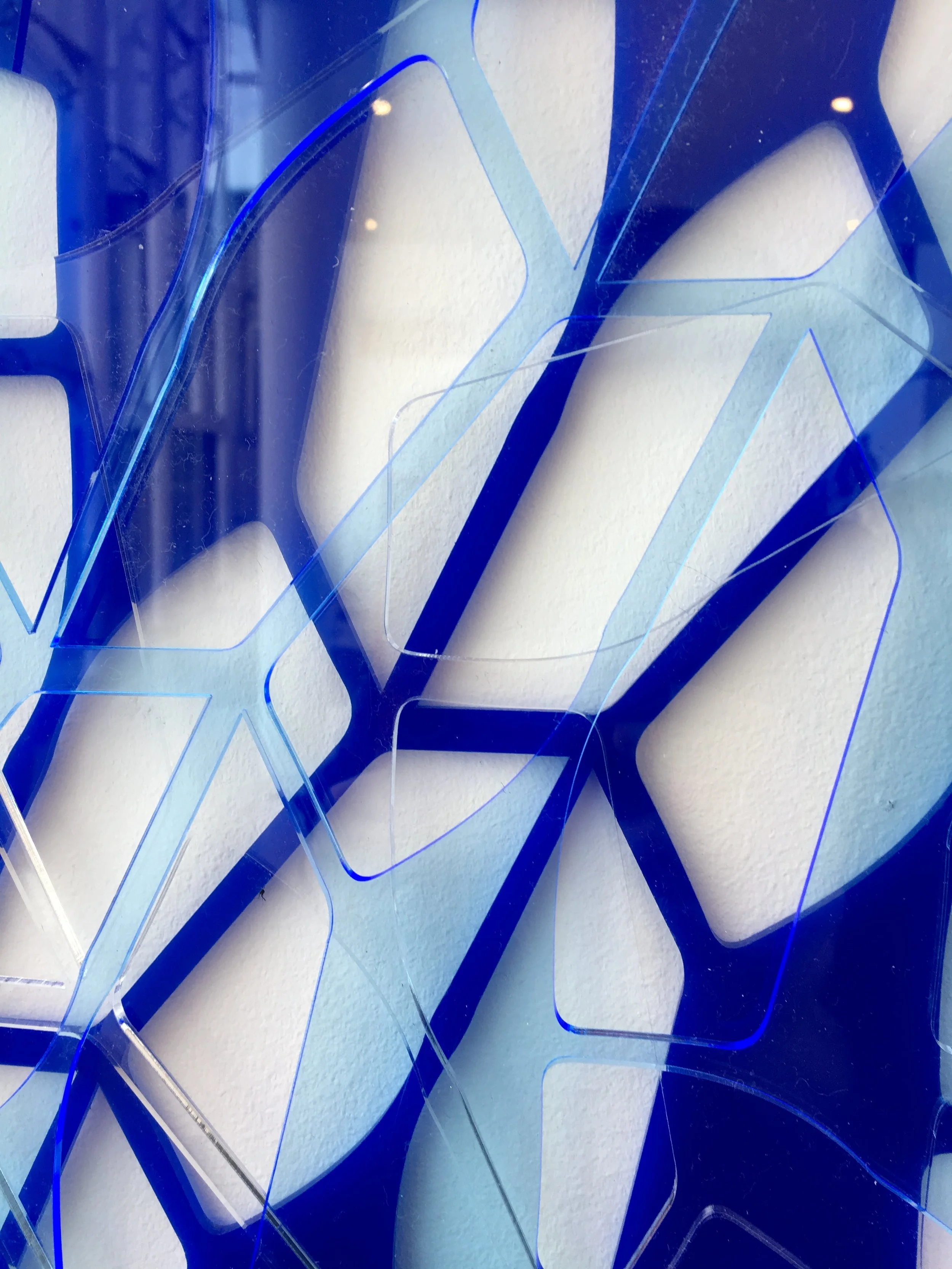  Finished piece (close-up): 3 sheets of acetate cut with pentagonal tesselation pattern. 