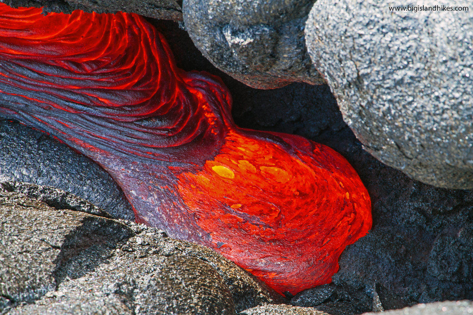 hawaii volcanoes flowing lava.jpg
