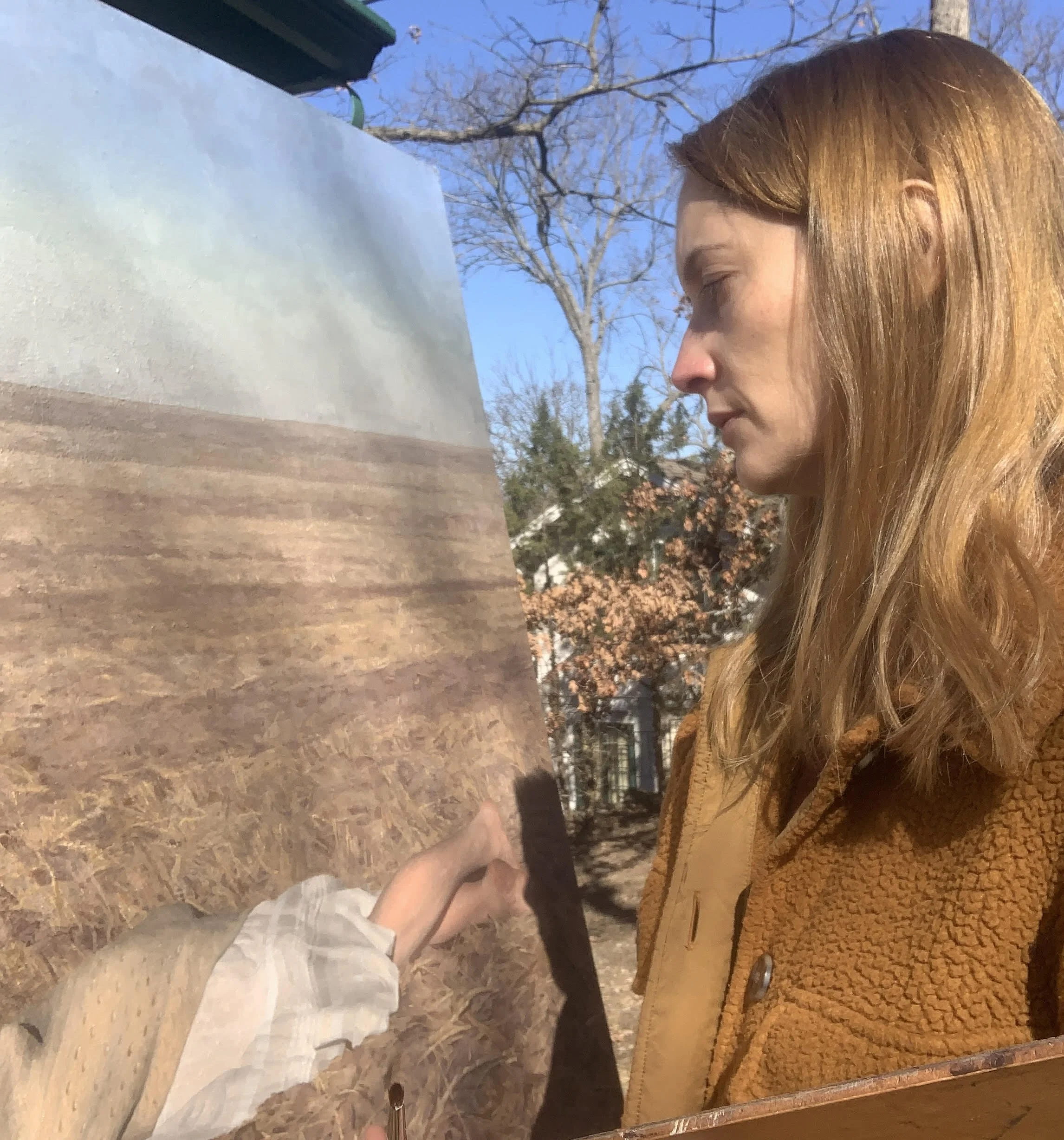 Anne Herrero working on a painting