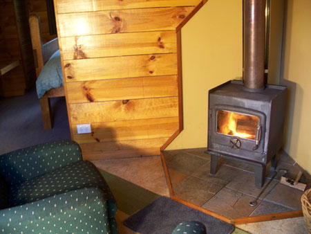 What could be more romantic than relaxing in front of the wood fire in your own private cosy Cradle Mountain Tas cabin accommodation with log fire?