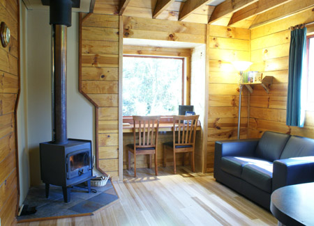 This cosy double cabin has a separate lounge / dining area with recliner chairs. Lay back and relax in the wilderness of Tasmania at Cradle Mountain Highlanders Cottages self contained cabin accommodation. 