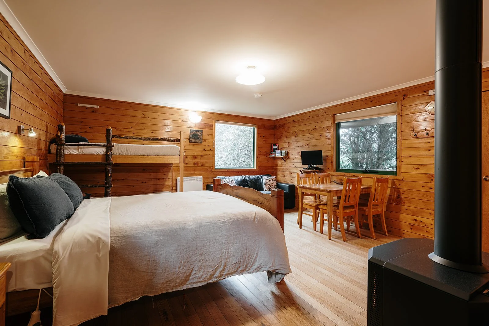 WW bedding dining and couch and fireplace.jpg