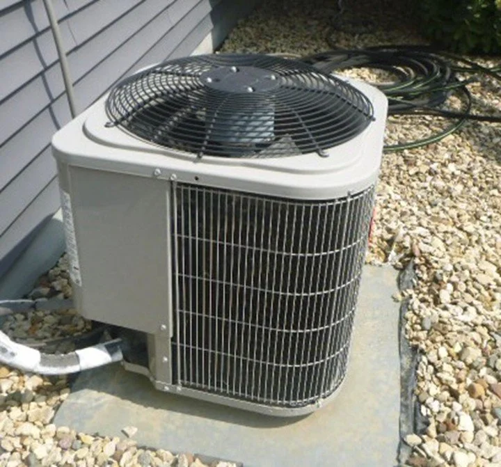 Air conditionin unit sitting on pad