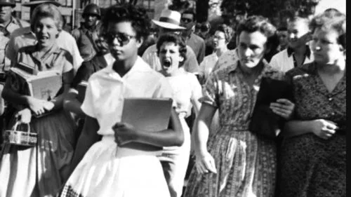 Elizabeth Eckford, age 15, pursued by a mob at Little Rock Central High School on the first day of the school year.