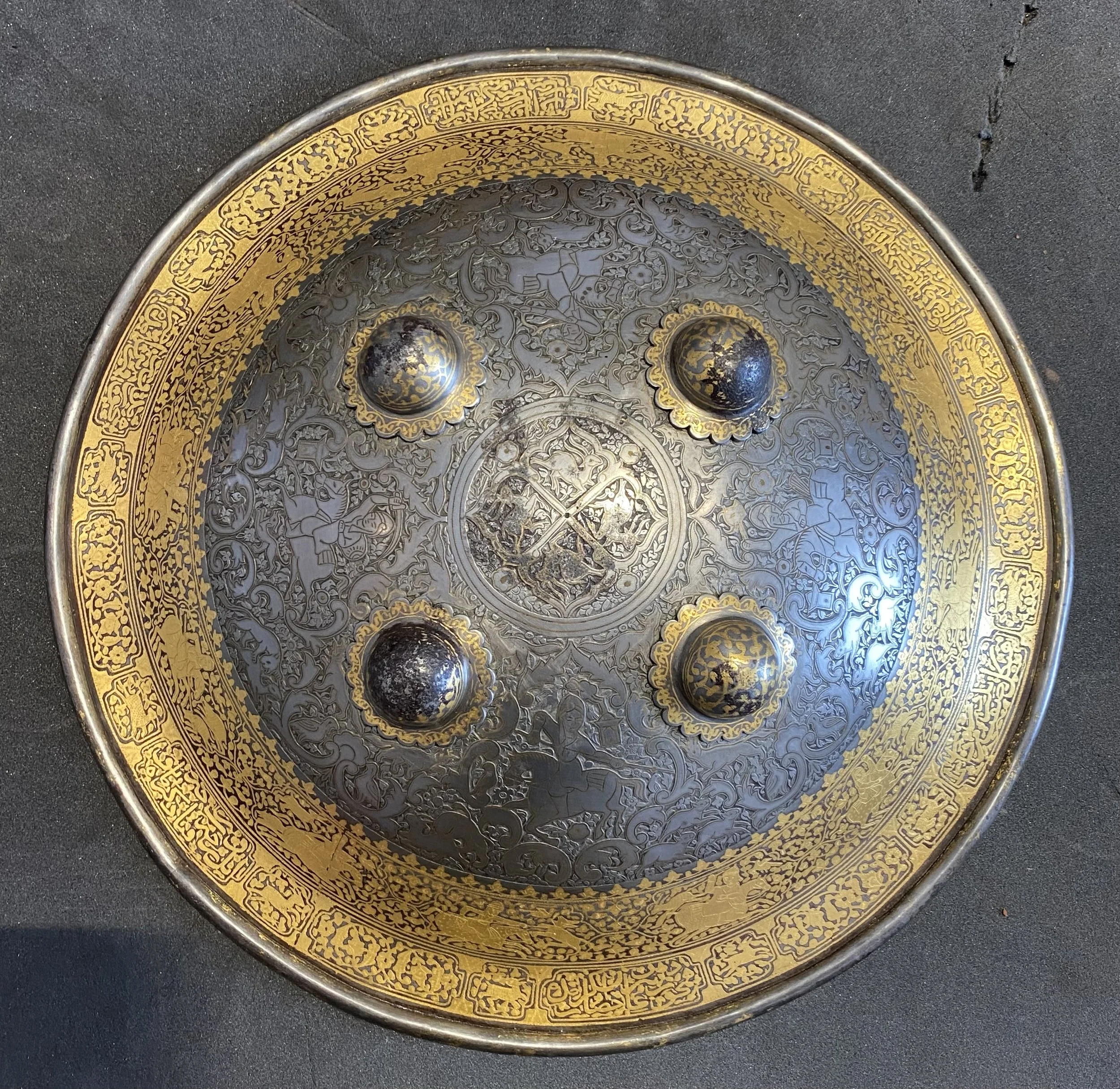 Shield with floral engraving