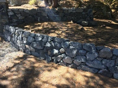 Drystack wall made of large stones enclosing an area