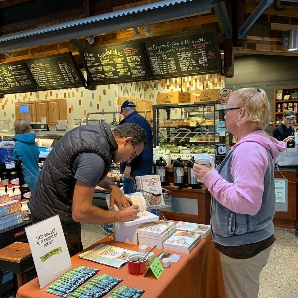 Signing books at Outpost Natural Foods (Mequon, WI)