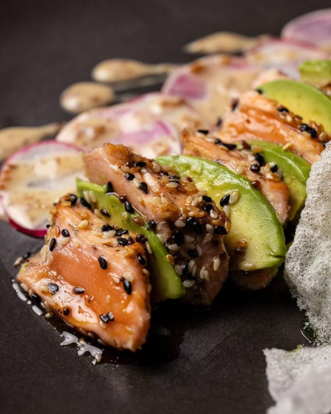 New in The Wine Room, delicate salmon tataki paired with avocado, bright ponzu and crispy rice, finished with sesame and pickled radish.

Have you tried it yet?

Photo by @tommylaurendet 
Dish created by @chef_davey_food 

#newmenu #twr #balgowlahrsl