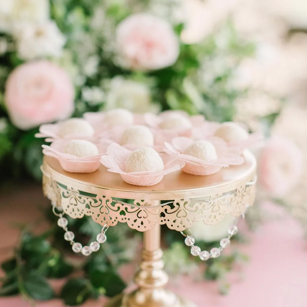 Celebrate love with a sweet touch of elegance. Our Coconut Brigadeiros are delicately handcrafted , a sweet accent to your wedding table. 
.

Venue: @balmorheaevents 
Photographer:@picturethisforeverphoto 
Brigadeiros: @latelierdubrigadeirosatx 
Cake