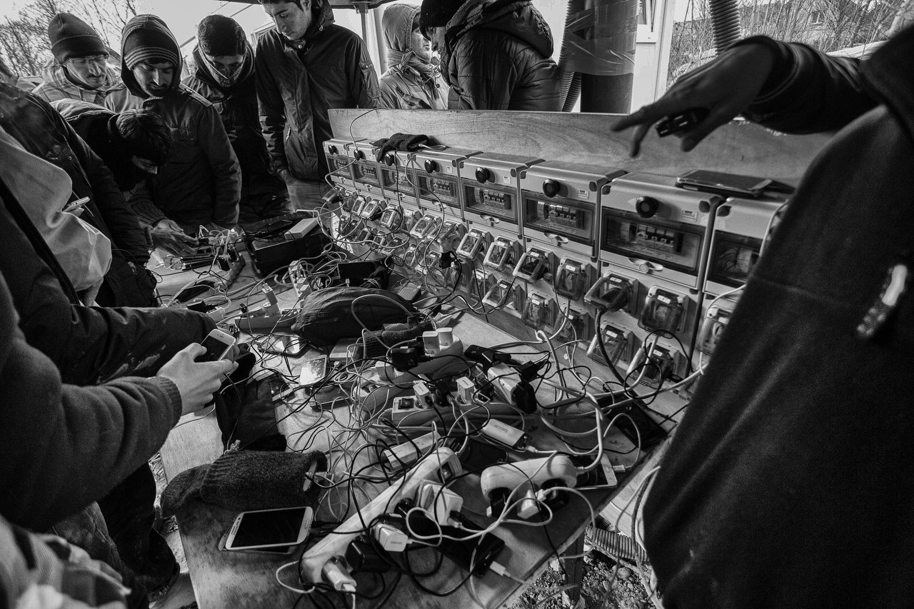  Power charging station for mobile phones at the makeshift camp of Grande-Synthe, Dunkirque, France, January 15, 2016. Photo Delmi Alvarez. 