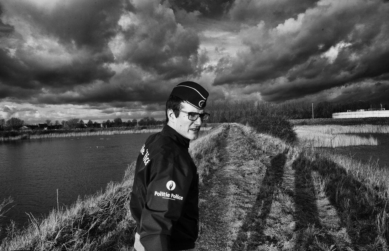  Local police commissioner and chief operating Toon Fonteyne in Veurne, Belgium during a usual checking at the former suggar factory, a place where the transmigrants spend the night prior to hide in the lorries, in Veurne, Belgium, February 9, 2016. 