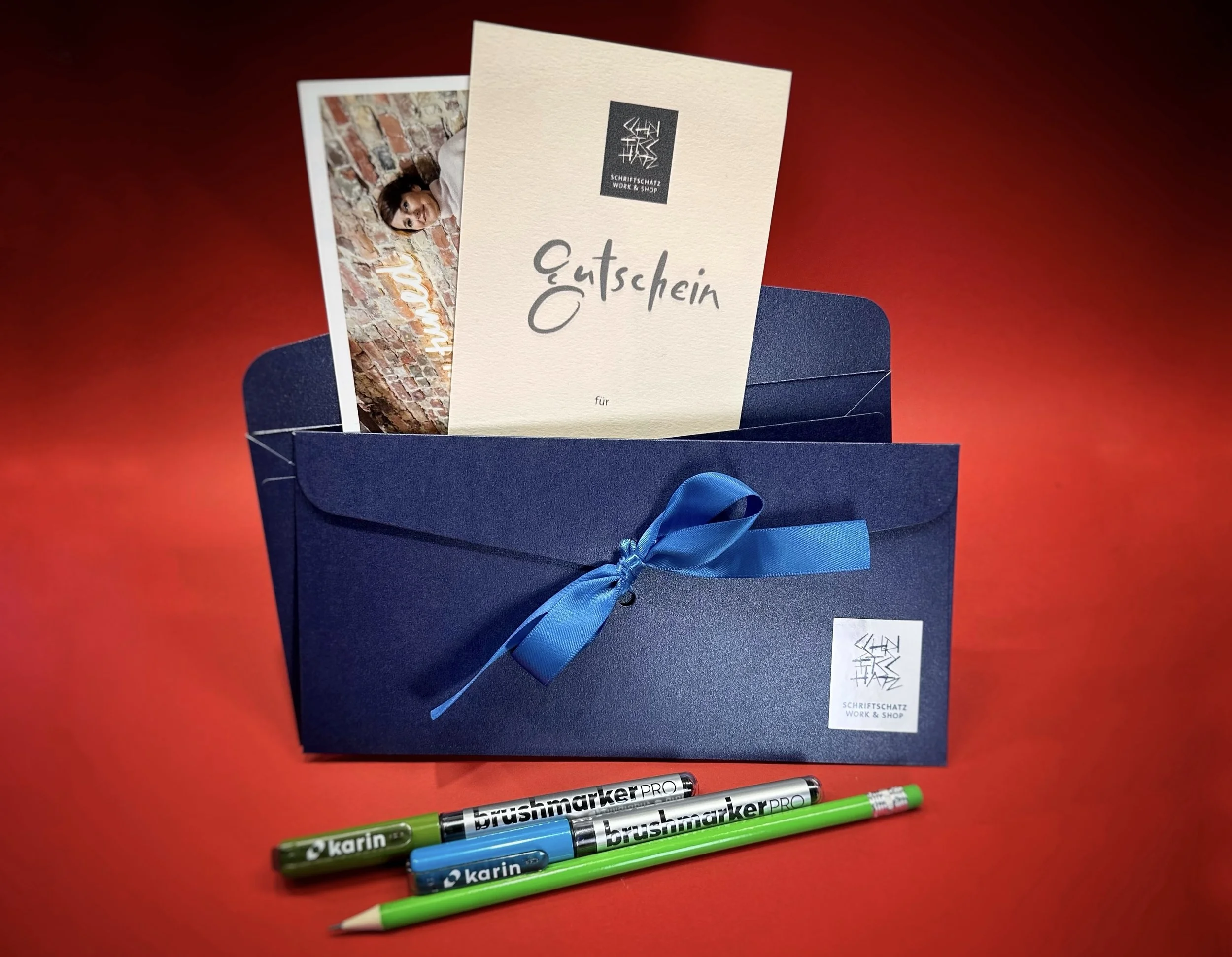 Geschenkgutschein mit gratis Stifteset