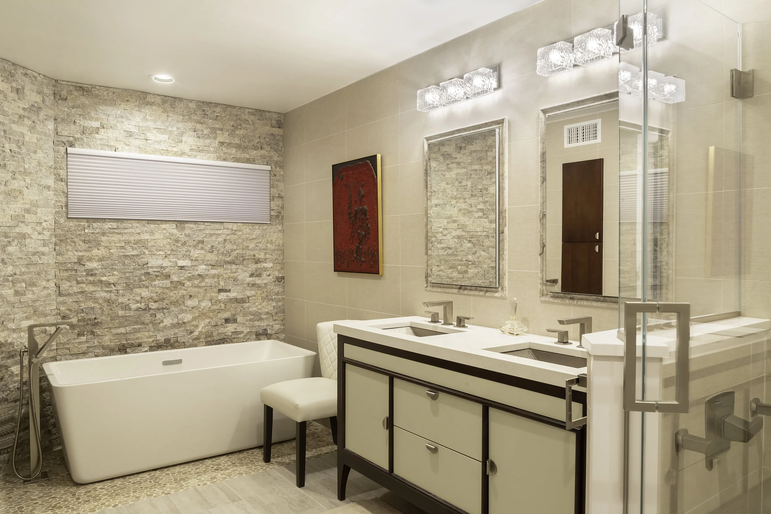 Large bathroom with double sink and plunge tub