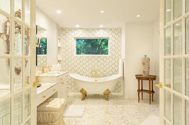 Talk about a gold rush
Products used: 
Calcutta gold marble 
Mother of pearl mossaic tile 
White thasos