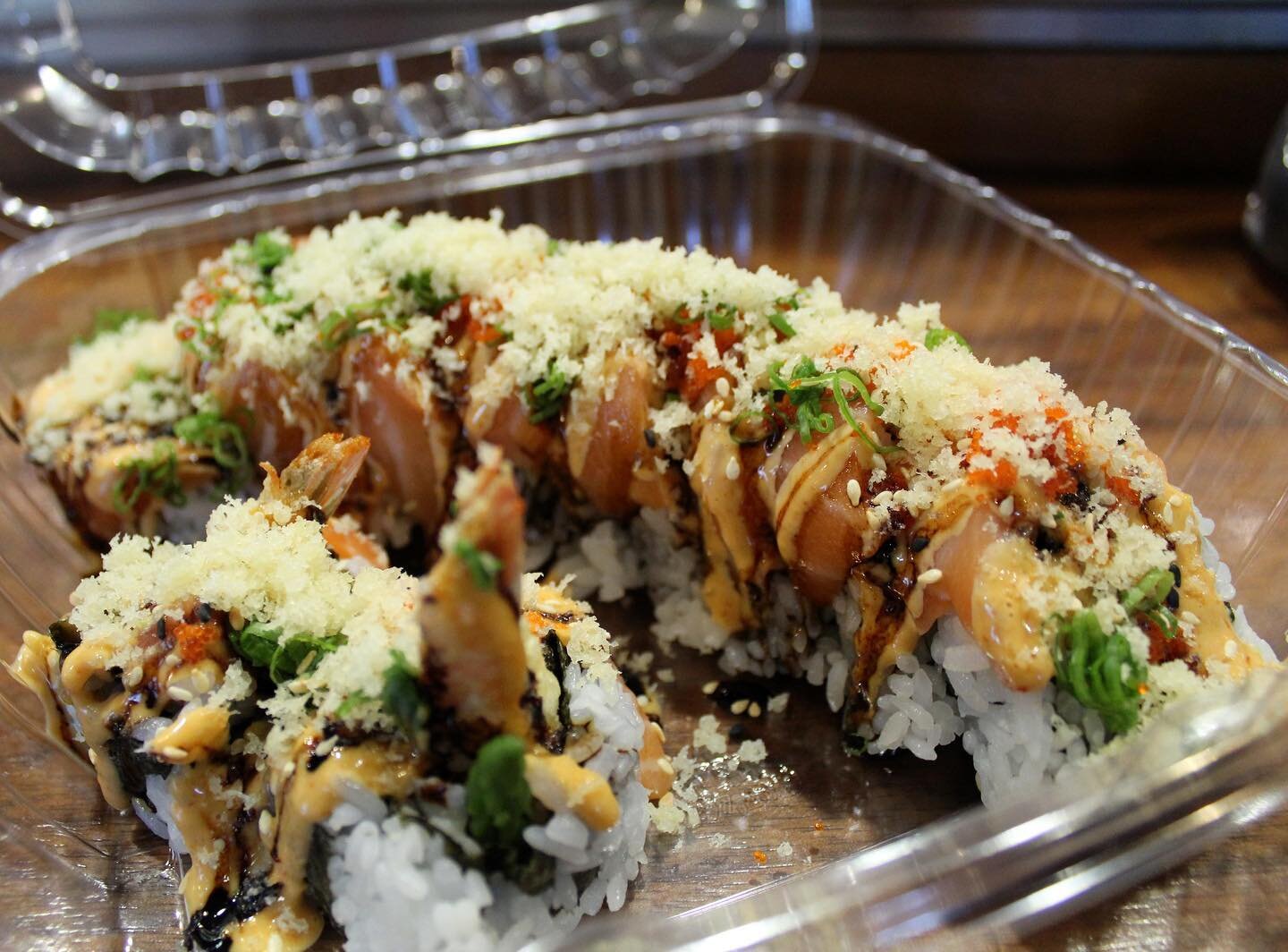 &bull; Top Secret Roll (packed for carry out) &bull;

ingredients:
shrimp tempura, spicy tuna, crab mix, avacado, cream cheese, asparagus, topped with salmon, spicy mayo, eel sauce on fire

photo creds:
@jayniescameraroll

COME VISIT US!
📍 find us o