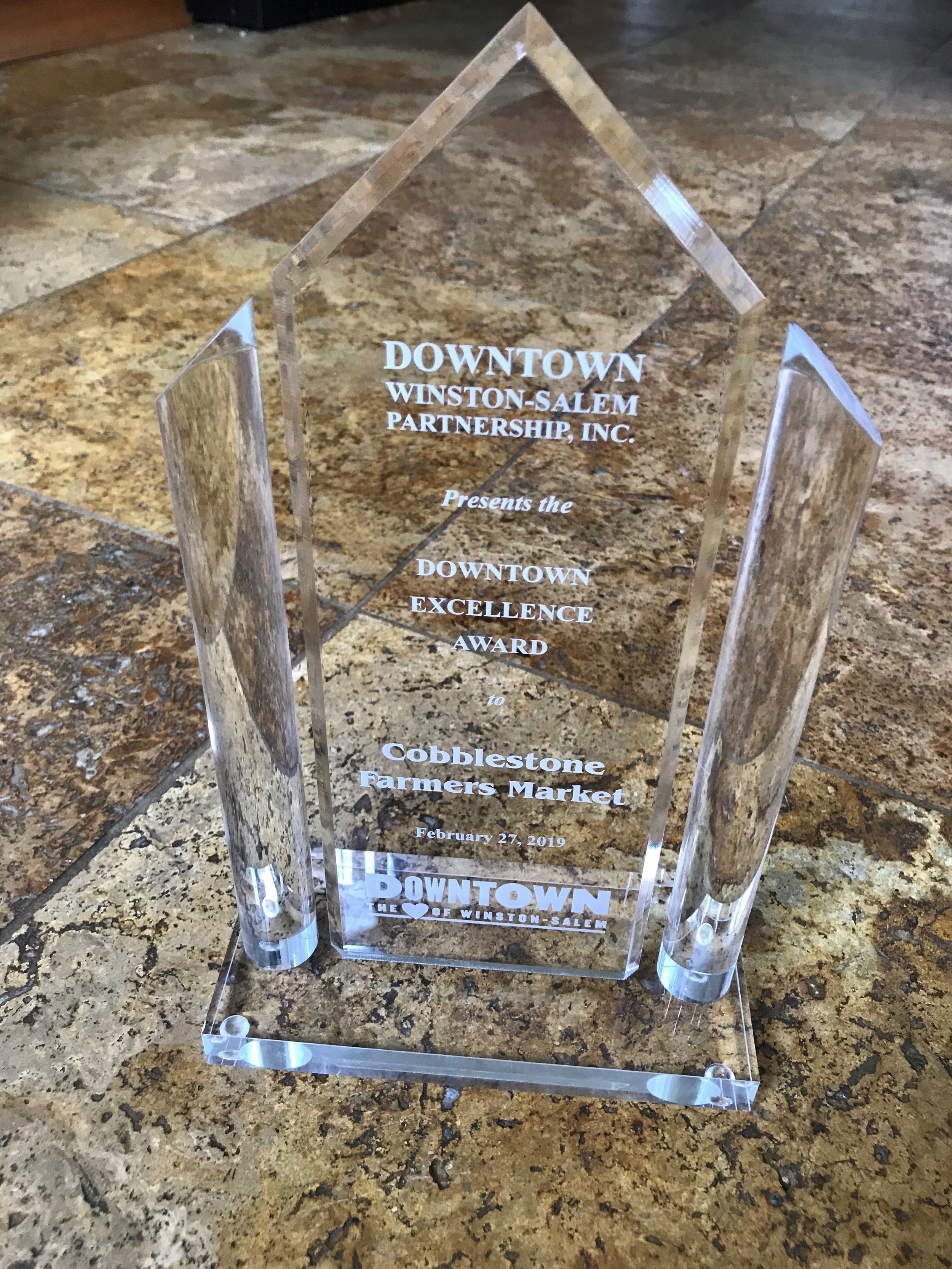 The Downtown Excellence Award goes to CFM!