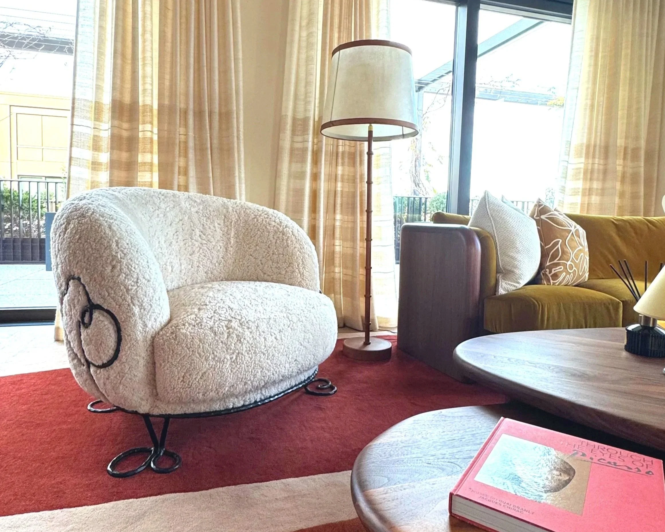 sheepskin chair made by roads2joya for BOS Studio with a metal frame shown in their Chelsea project