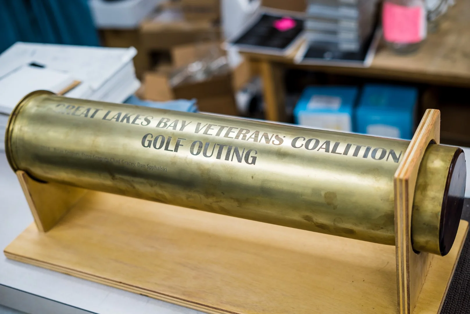 The brass shell from a WWII Navy cruiser’s 5” gun, engraved for a local veterans group