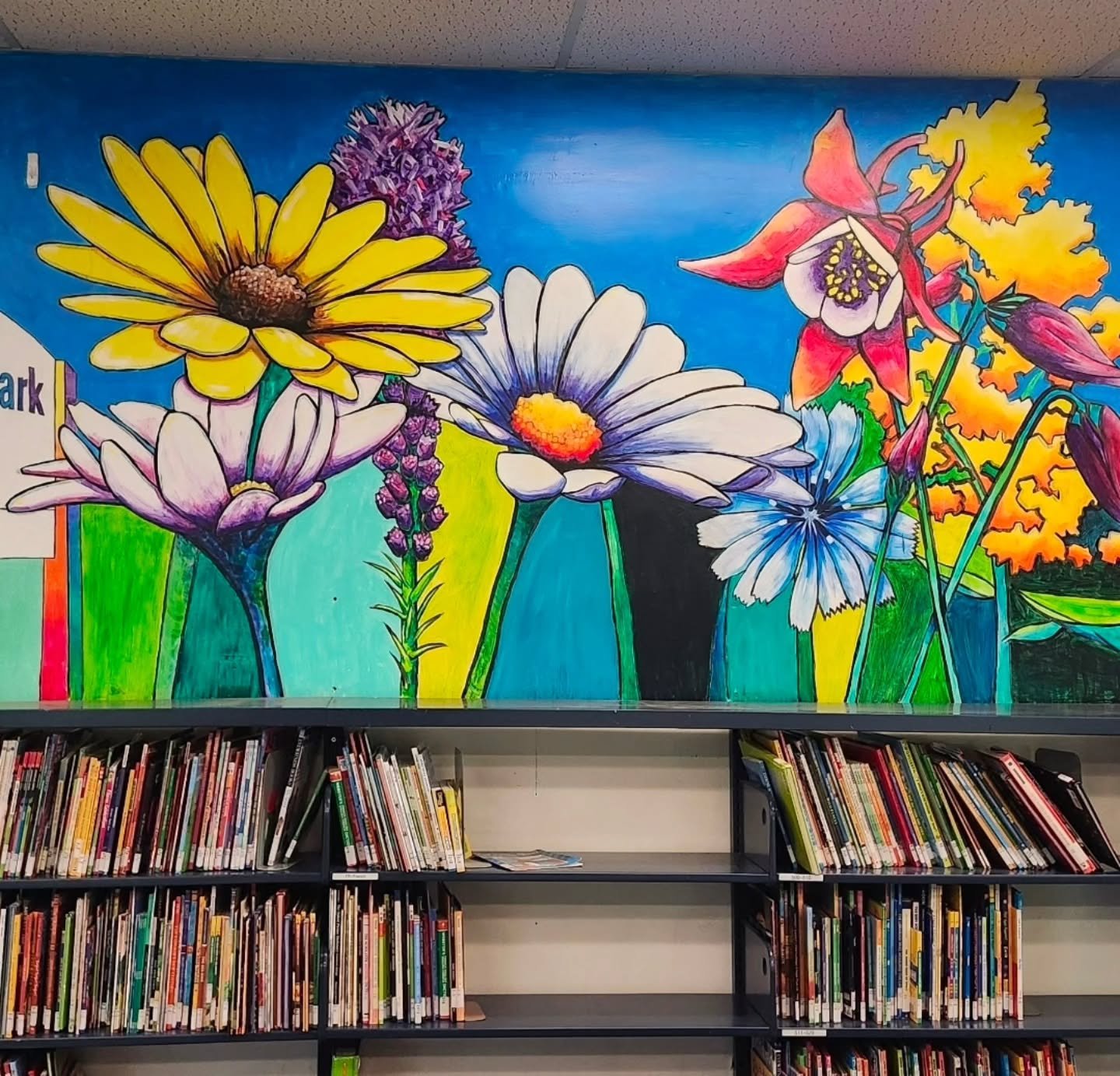 So I've painted a couple of murals but I haven't posted any images of them. I have been really loving the opportunity to paint on the walls of schools... without having to be sneaky about it. I'm sure I got into trouble multiple times as a kid for do