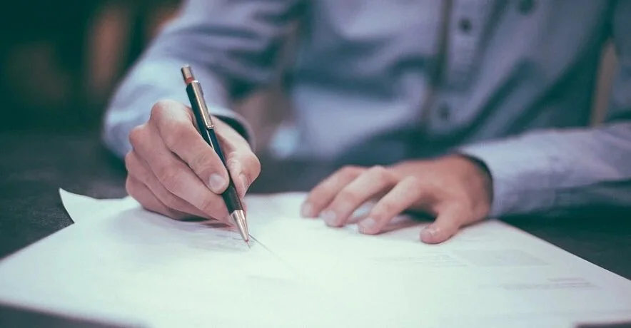 Hydrogen-fuel-cell-agreement-Person-signing-documents.jpg