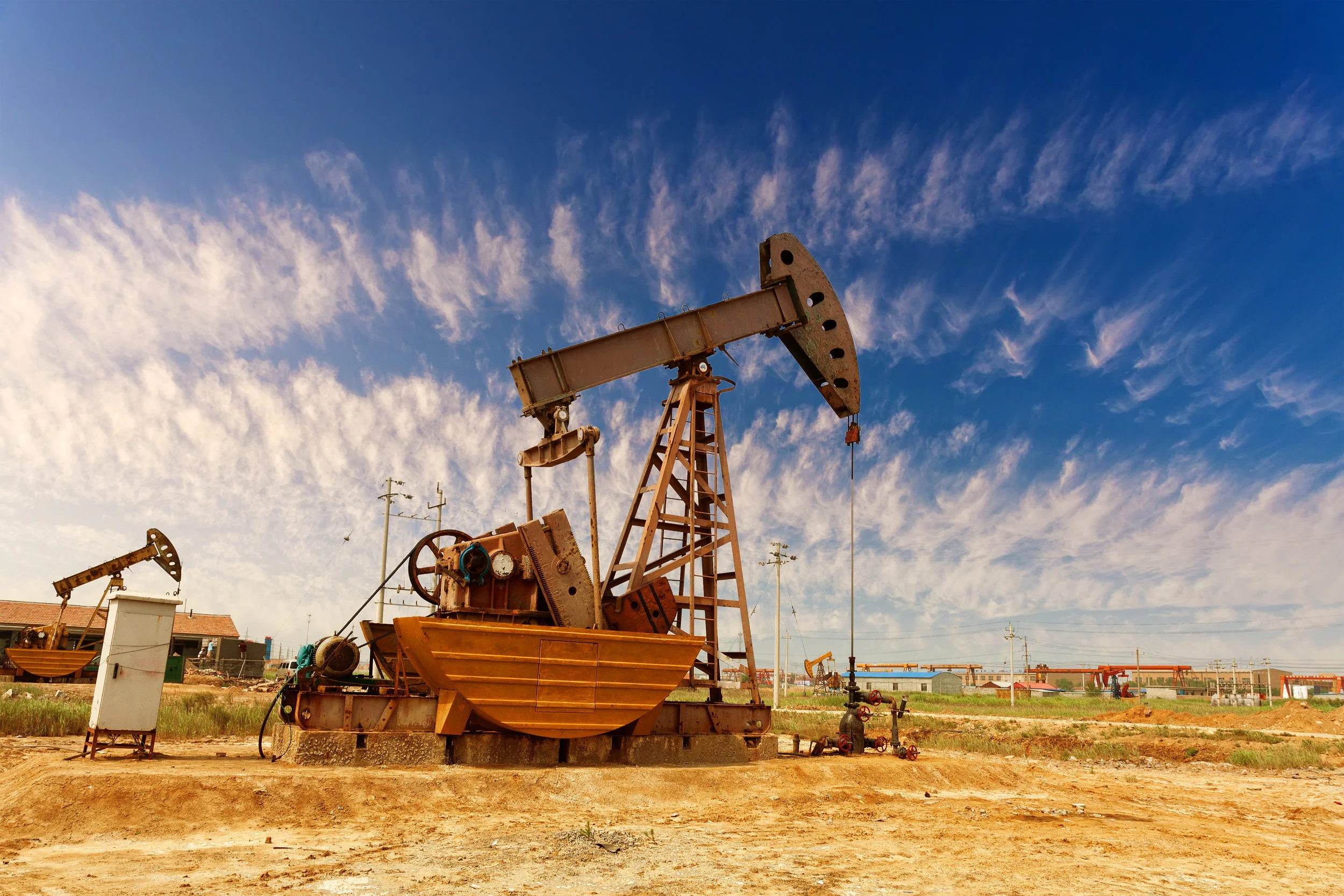 pump jack with blue sky shutterstock_279286190.jpg