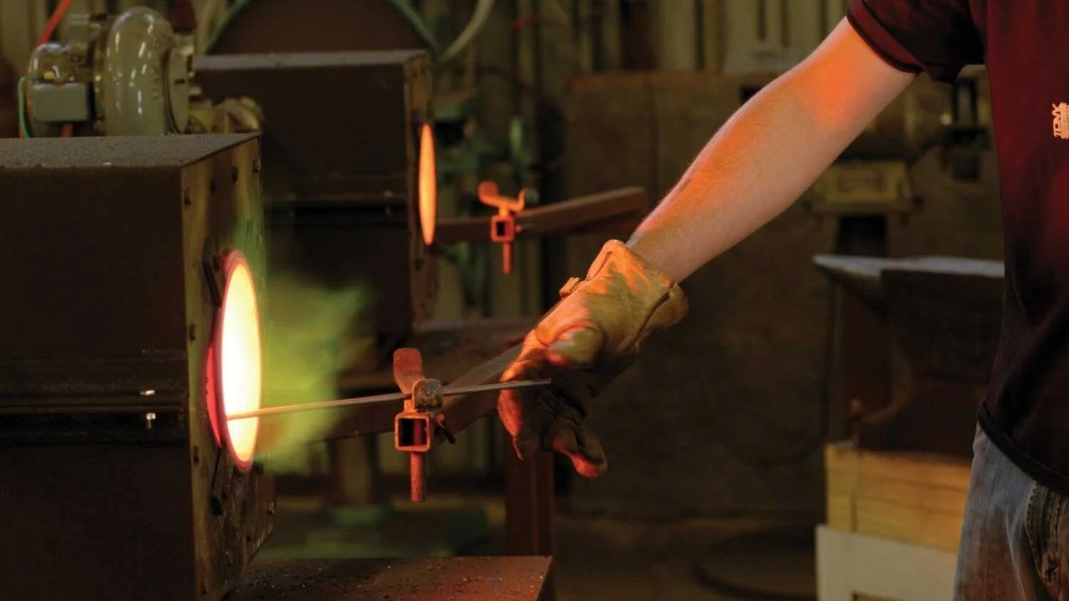 A man works in Haystack's blacksmithing studio