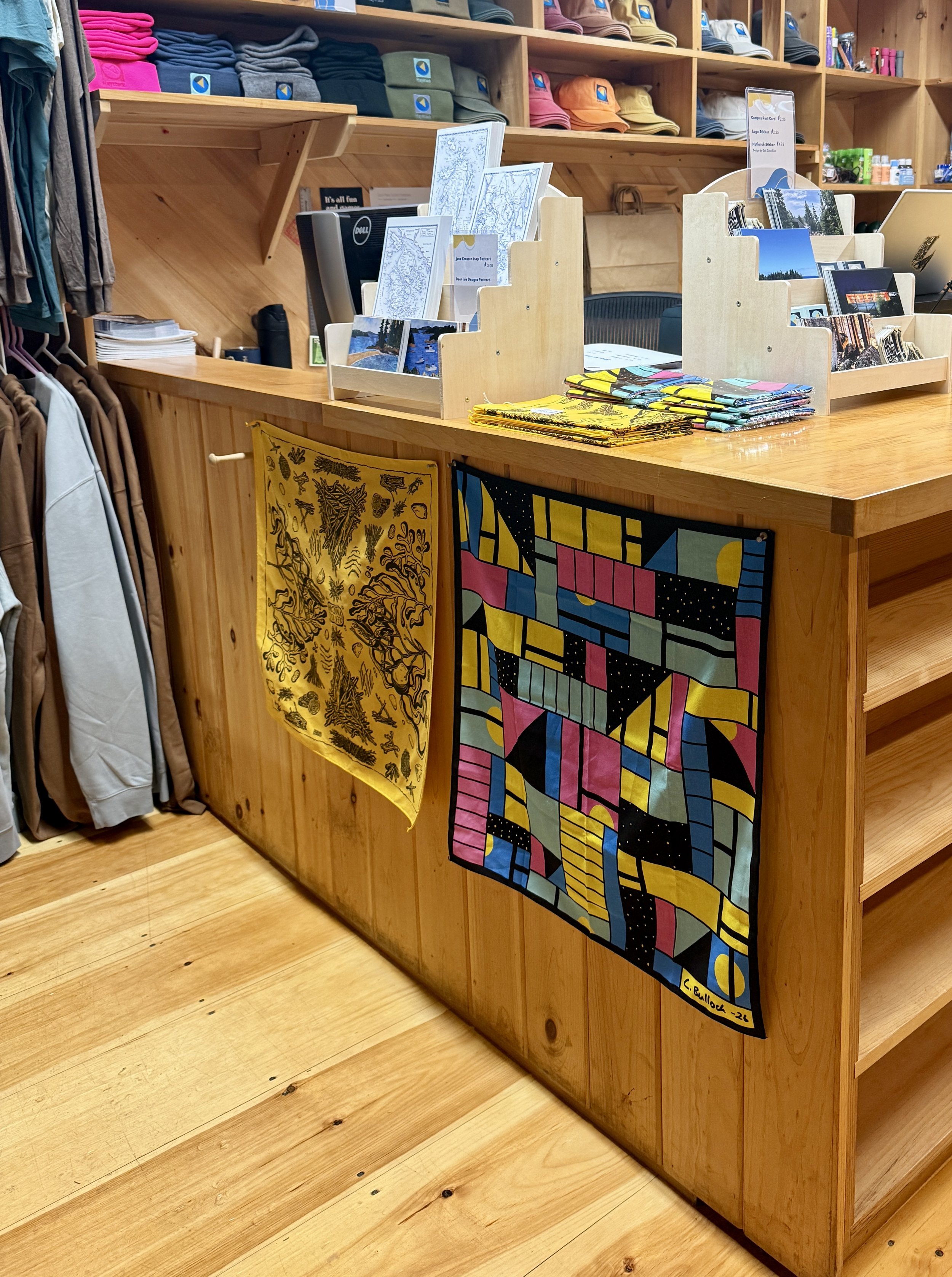  The 2025 Haystack bandana (left) and the 2026 Haystack bandana (right) on display in the Store! 