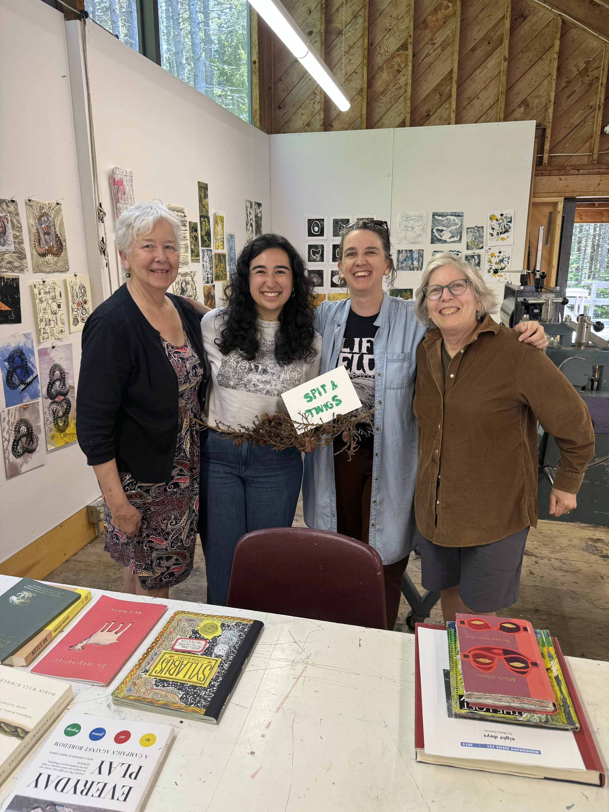  The 2024 Session 1 Graphics workshop,  Seed, Till, Reap .  L to R: Audrey Bellinger (participant), Sophia Parker (studio assistant), Natasha Bowdoin (faculty), and Lauren Comando (participant). 