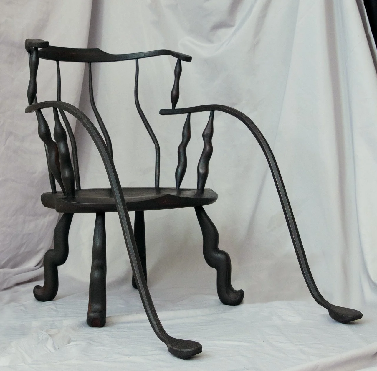   Creep , Haniel Wides, 2025; red oak, pine, cherry, Milk paint; 42" deep x 28" wide x 34" high 