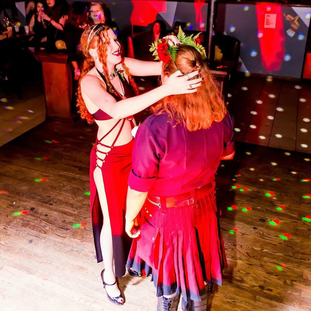 Marsha crowns a guest at an AfterMath event.