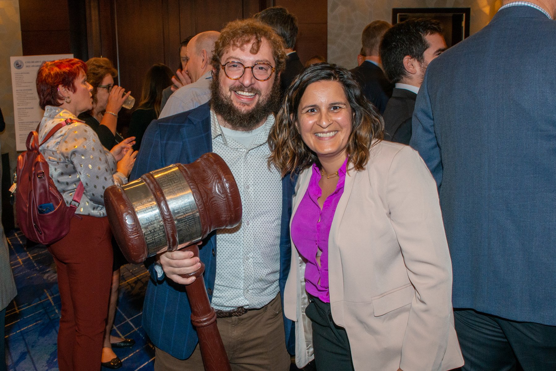 DSC_6164 Eliott Reaven and Ruchi Kapoor 2022 Attendees with gavel (courtesy of Hartmannphoto, LLC).jpg