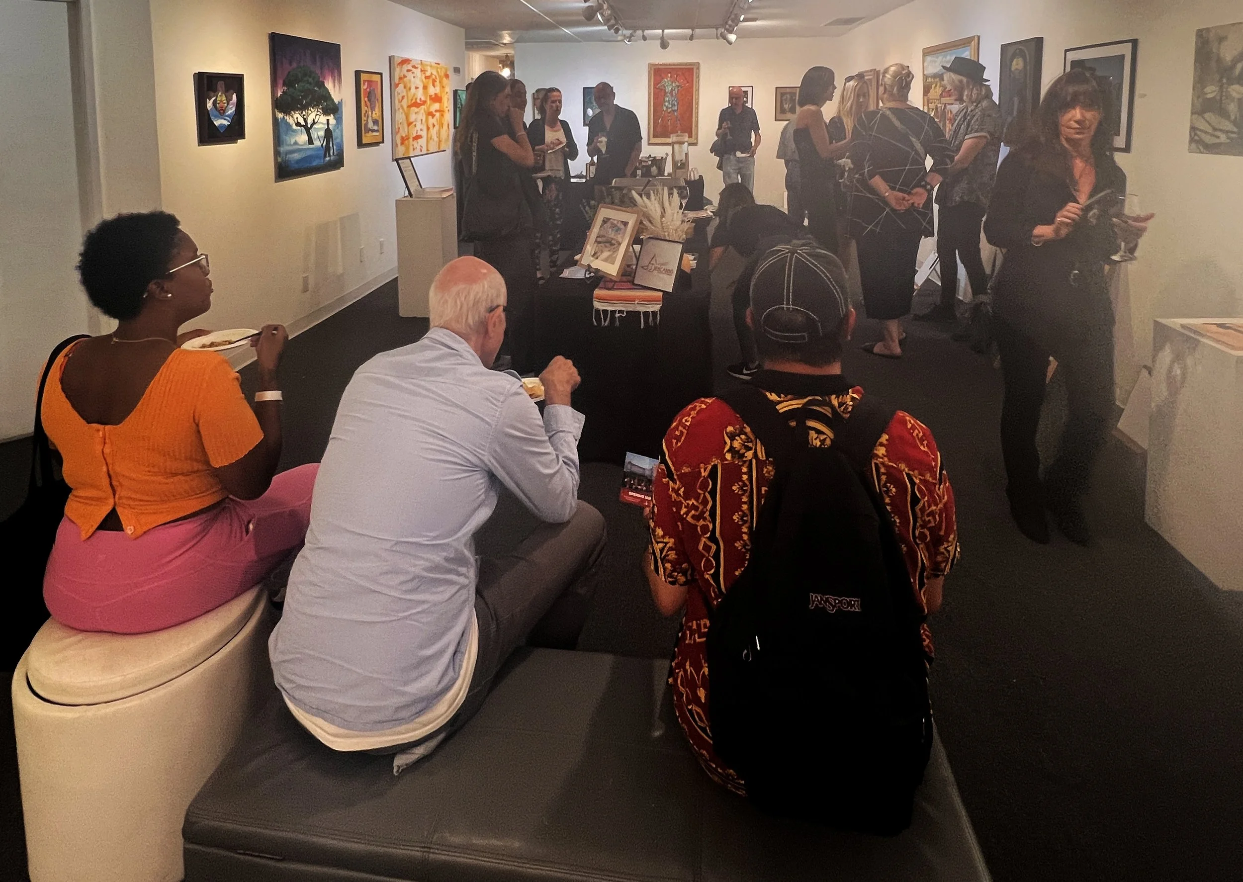 View of exhibition with guests IMG_3402.jpg