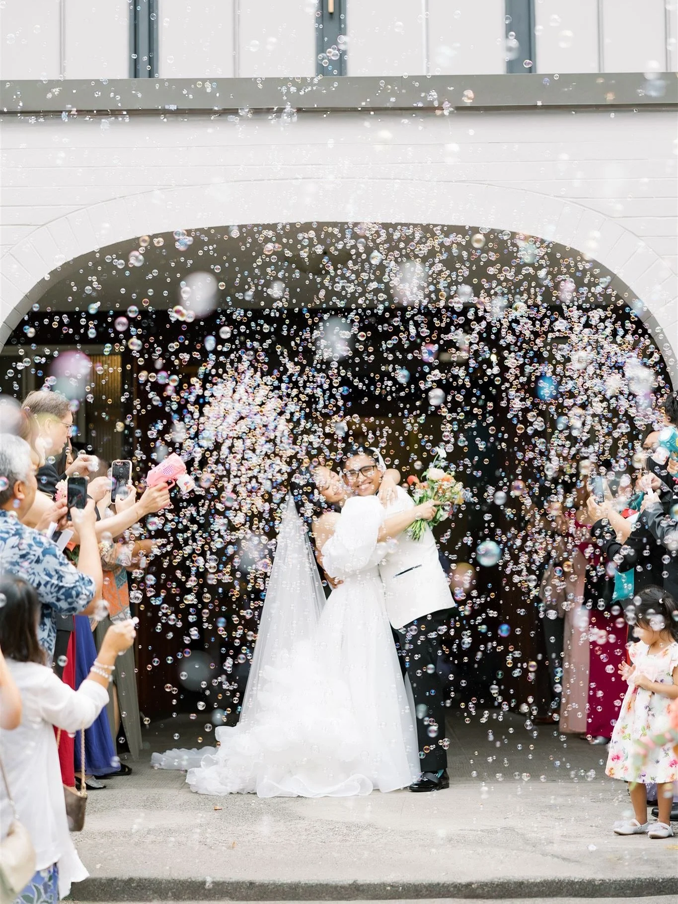 Some wedding moments feel like pure magic, and this bubble exit was one of them 🫧✨ 

Watching Cherica and Andre step out of the church hand in hand, with bubbles floating all around and guests cheering in celebration, was truly unforgettable. It was