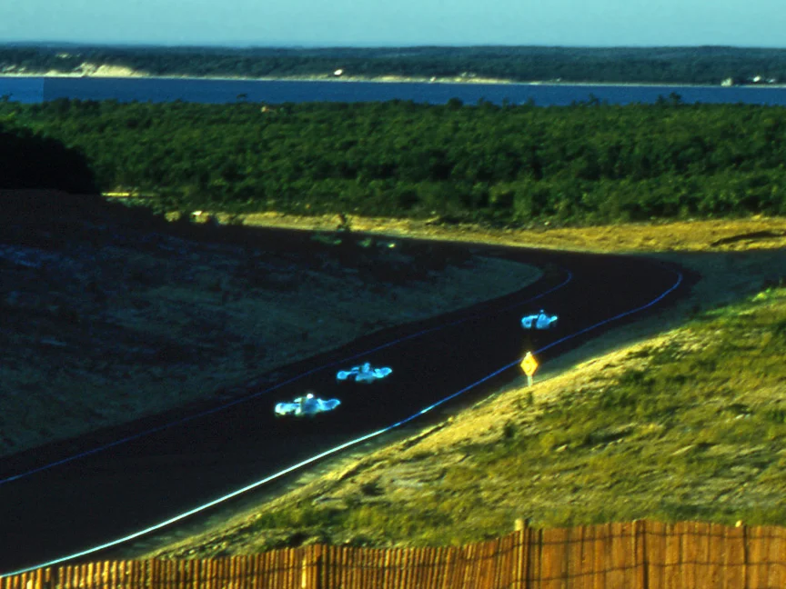 Phil Hill leads 2 of the Cunningham D Types into the valley of lefts. Cunningham brought 4 D Types for Walt Hansgen, Charley Wallace, Phil Forno and himself.