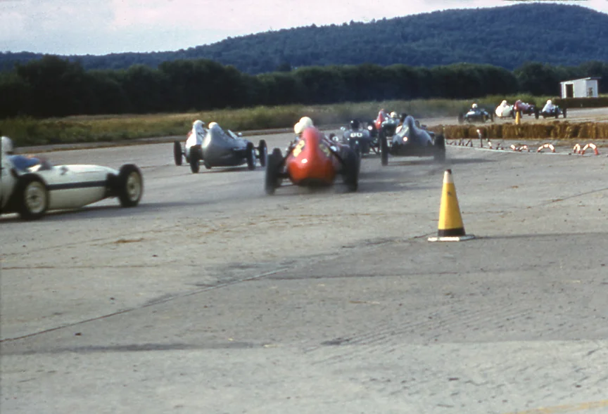 The start of the forumla junior race eventually won by Walt Hansgen’s Lotus. You can catch a glimpse of the black #80 of Harry Carter who was 2nd.
