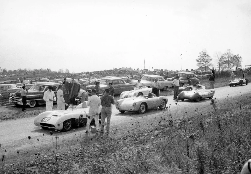Farther back on the grid are Len Bastrup's Lotus #41, Suzie Dietrich #131 in the Porsche and Gus Andrey in the #25 Ferrari.