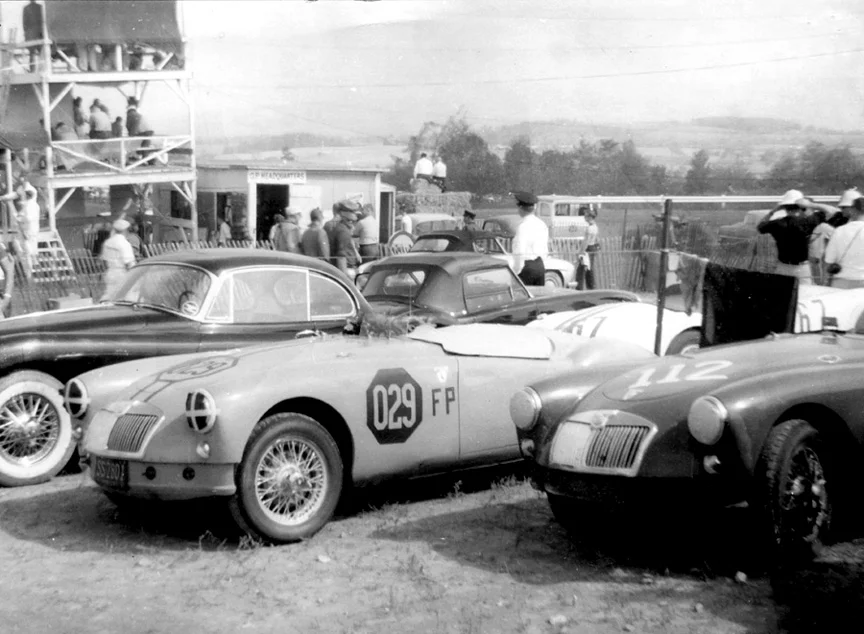 029 sits proudly in front of the timing stand. Sherm Decker’s 4th place #112 is on the right.