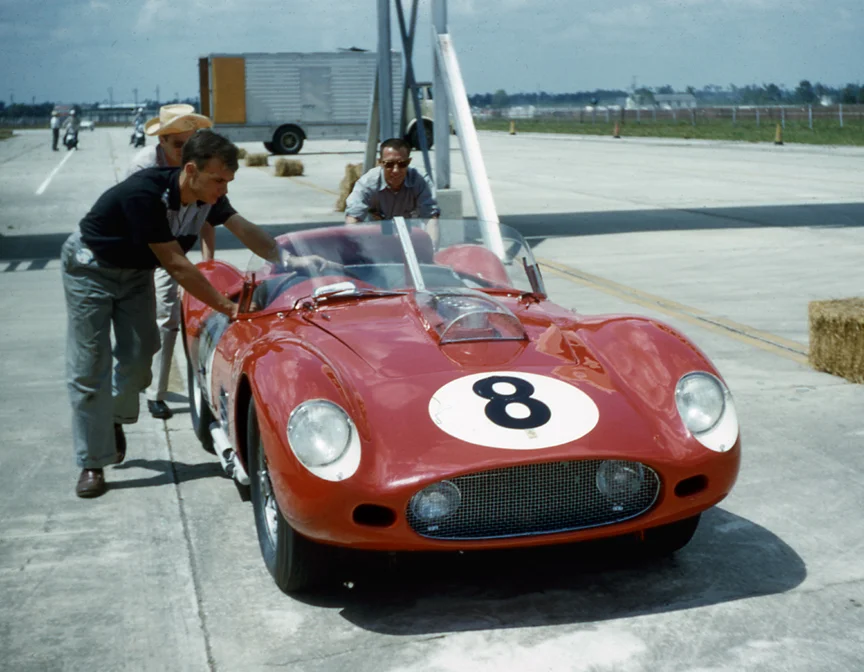 The Lovely/Nethercutt car is pushed to the starting grid. I have always thought the 250 TR 59/60 to be among the best looking race cars ever.