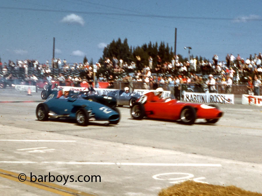 The flag drops and Hall gets a slight lead on Crawford but Hansgen is barely moving with a bad motor.