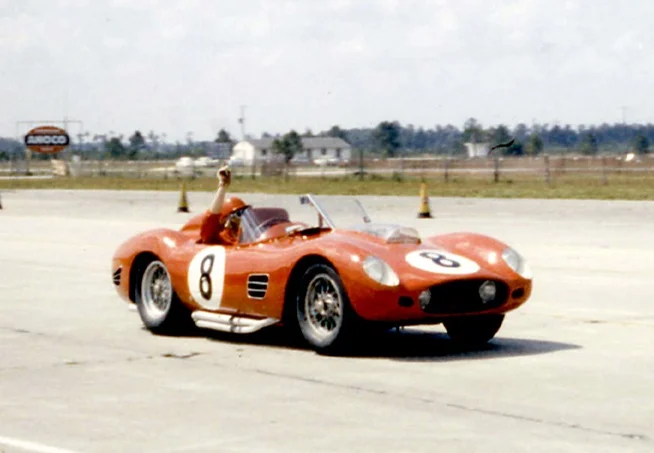 Jack Nethercutt signals he is coming into the pits in his Ferrari Testa Rossa 59/60. He and Pete Lovely would finish 3rd overall.