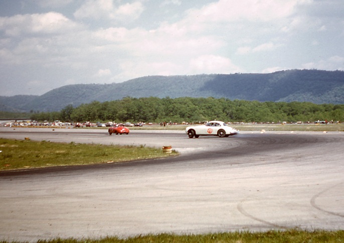 Color shot of an XK-150 losing it, but a good glimpse of the great hills that surrounded western Maryland.