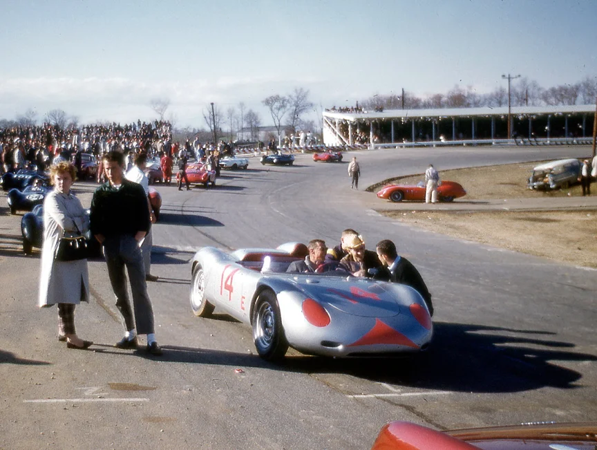 Bob Holbert sits on the oval starting grid.