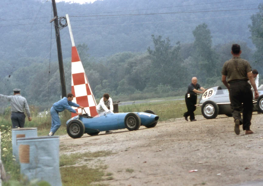 Denise pushes her car to the grid, but was this the July or August race?
