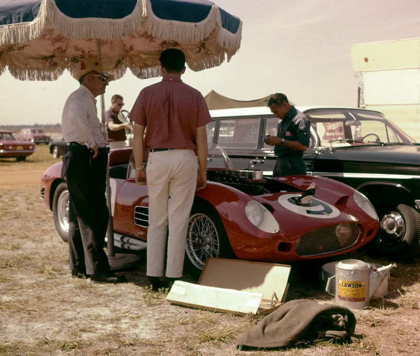 The Nethercutt Ferrari being looked after in the grass. The Nethercutt family was/is Merle Norman cosmetics. Unfortunately on this day the usually reliable Ferrari’s oil pump quit on driver Pete Lovely.