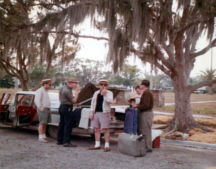  Jerry Kenyon’s ‘59 Ford has arrived with Joe Tierno, Roy Bishara and SAAB Reutlinger.  Nicholas watches as Bishara informs us of his IQ 