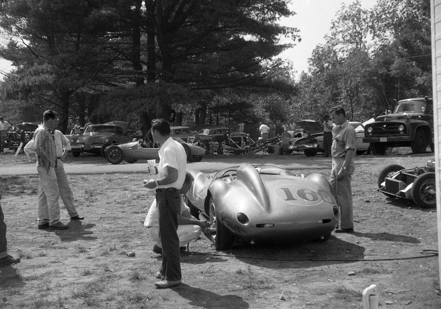 Paddock shot of how beautiful the woods of Thompson were and how these priceless cars were prepared. Today teams would faint if they had to work on their cars in the dirt.